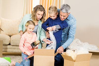 family opening a box